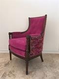 Sumptuous Christian Fischbacher raspberry pink velvet lines the inside of this vintage 1940s high back barrel chair. The outside is wrapped in a flirty textural silk blend, all finished off with silver nailheads. The wood trim has been cleaned and polished, while retaining it's vintage character.