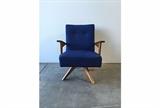 Mid century modern chair with original indigo textured fabric, wood base and arms. Chair swivels and rocks and is in the style of Adrian Pearsall. 
