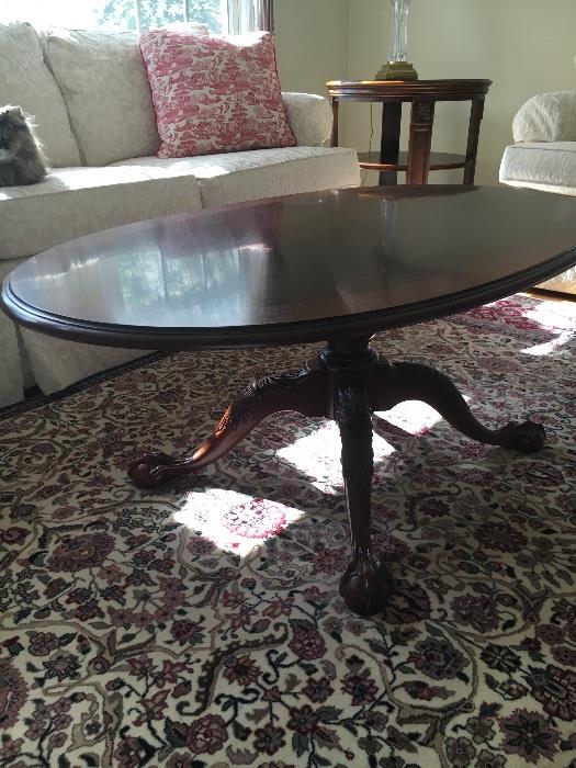 Ethan Allen coffee table with ornate, carved bottom. Excellent Condition.