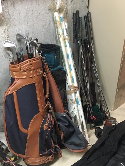 Miscellaneous golf clubs and bags.