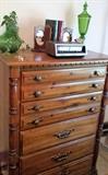chest of drawers, green glassware, radio