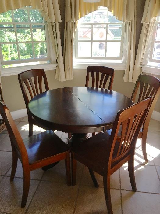 Round dark wood table & chairs