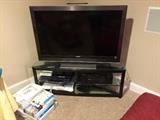 46" Sony Bravia flat screen tv. Nice tv stand too. Wii system with several accessories