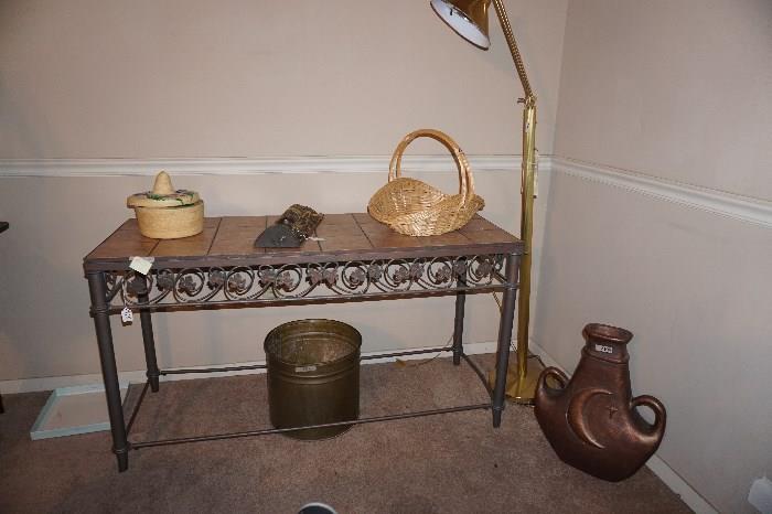 Sofa table metal base tile top, brass planter decorative jug, mask, lamp