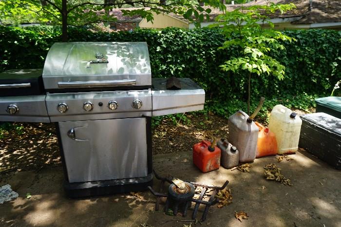 grill with repair parts, gas cans, fire grate