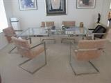 Chrome and glass dining room table and 6 chairs