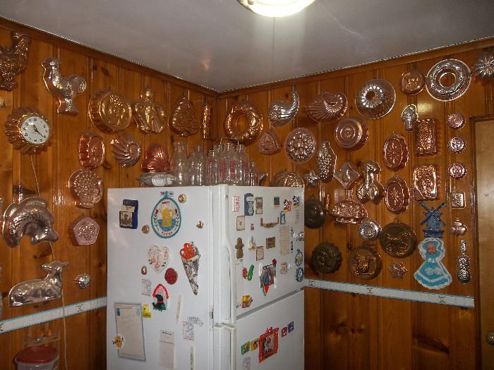 every wall in kitchen and every cabinet is full all antique to vintage