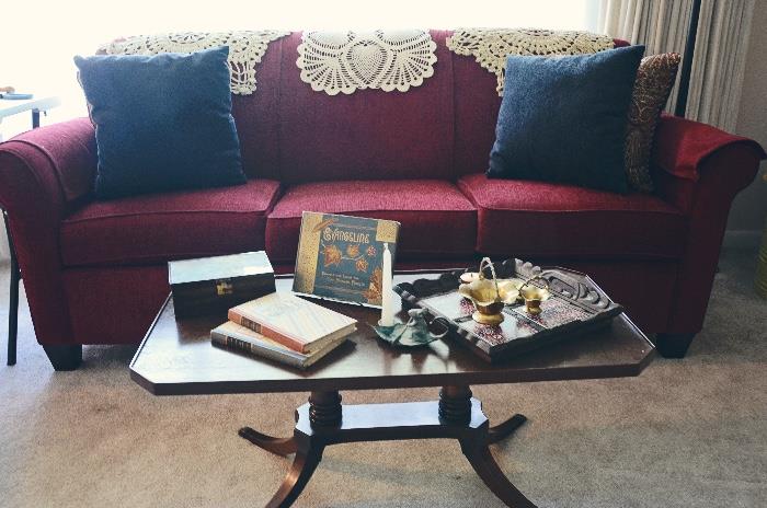 Sofa Mart sofa with flexsteel, Claw foot coffee table, Longfellow's Evangeline decorated with leaves from the Acadian Forest (1887) book