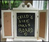  Child sized chalkboard with cork boards - charming!