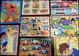 Children's puzzles including Sesame Street and Warren Industries