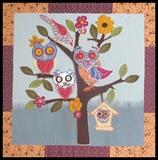 Hand stitched applique fabric wall art with owl motif 22" x 22"