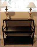 book shelf with two lamps