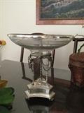 Silver plated center piece with birds holding chains, lg glass bowl and claw feet