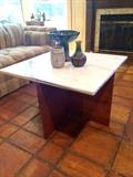 Mid-century modern cocktail table with wood base and marble base 