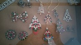 Christmas tree pins and other costume jewelry, some sterling 