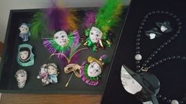 Collection of lady face pins and fab chunky lady necklace and earring set signed Sandee
