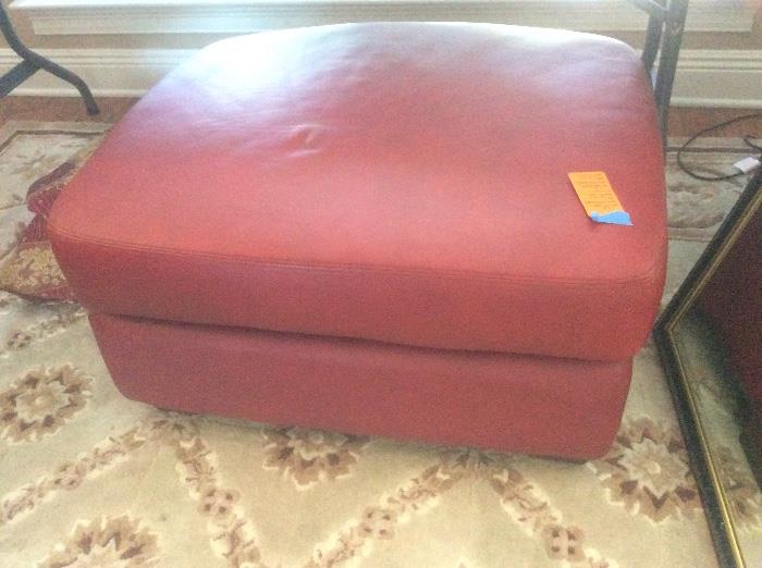 Leatherette red ottoman