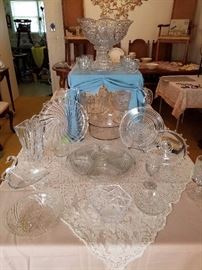 Crystal including punch bowl/stand/cups, Manhattan lazy susan (rare) & dinner plate, Heisey Lariat plate, Duncan & Miller swan, & more