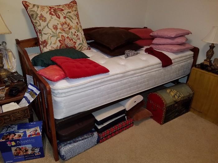 Day bed in like new condition, throw pillows, foam cushions, small trunk, & more. 