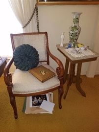 Arm chair, vintage photo album, Eastlake period end table, vase, hand made pillow, prints, & other collectibles.