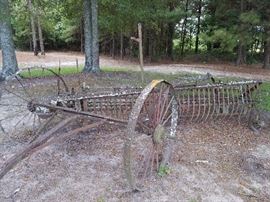 Antique side-delivery hay rake. 