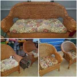 Fabulous wicker set including love seat, four total chairs (2 of each kind), & cushions. Heavy iron magazine rack. 