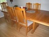 Richardson Bros long handmade dining table with six chairs.