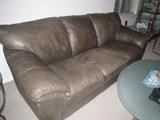 Natuzzi leather sofa, super comfy, excellent condition; photo does not do it justice.