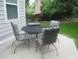 Patio set with cushions and umbrella