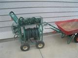 Garden cart and red wheelbarrow