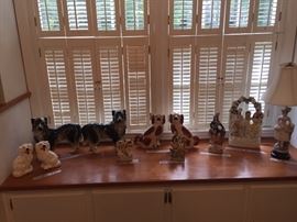 Antique and vintage Staffordshire as well as some 19th century Bo ' ness or Bridgeness Pottery dogs