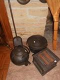 Antique Iron Cannonball tea kettle , foot warmer,covered pot and a rams head peel