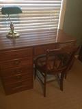 Desk with side chair and brass/glass lamp