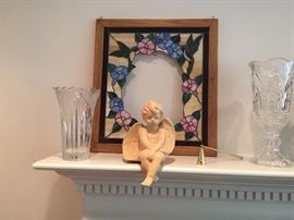 Stained glass, crystal vases and angels