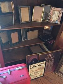 Picture frames and vintage luggage