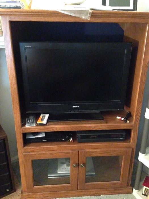 The Sony flat screen T.V. along with a nice quality cabinet to hold it!