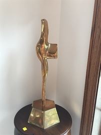 Alfred Burlini "The Defender" polished bronze statue.