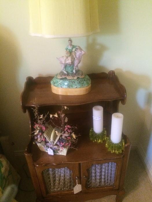 One of two matching provincial nightstands; one of a pair of vintage lamps