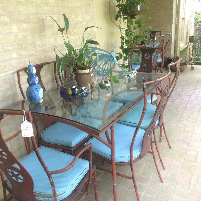 One of several glass top patio tables 