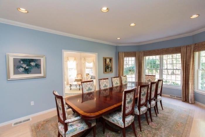 Fabulous Sudbury home features Double Pedestal, flame mahogany Dining Table from Mill House Antiques in CT.