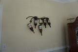 Decorative Wall mounted wine glass holder. 