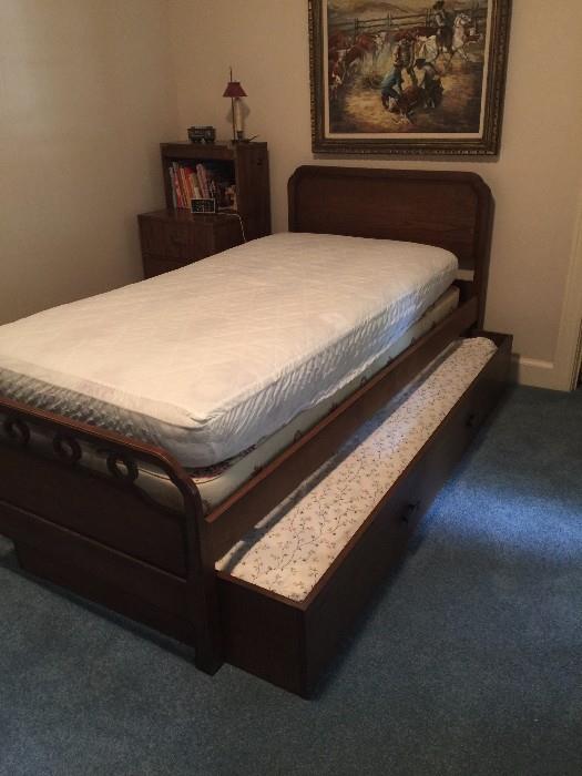 Space saving trundle bed