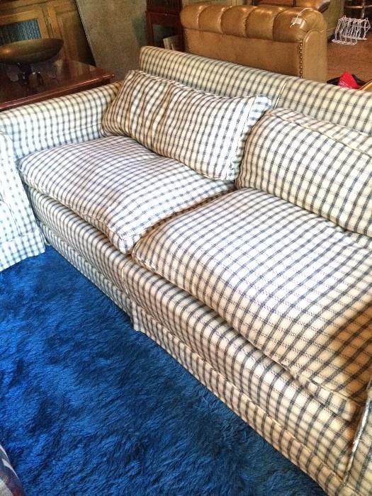 One of two checked sofas