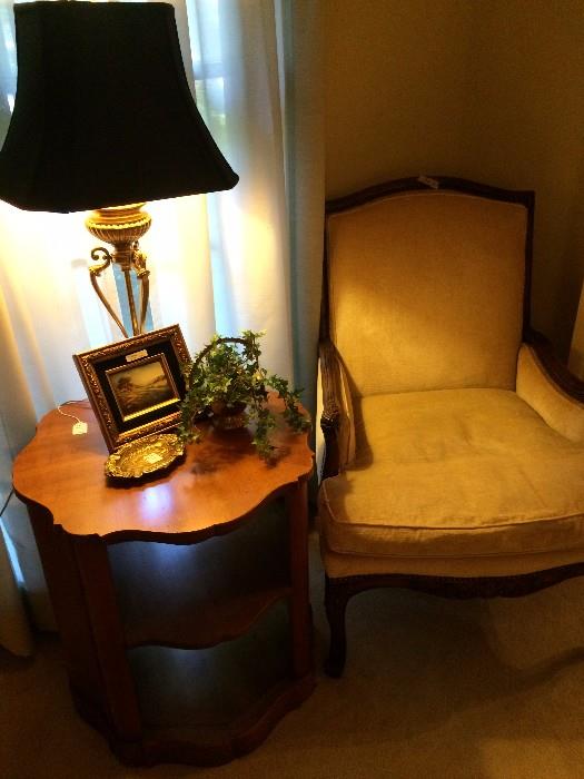 Formal chair has matching sofa; 3 tiered side table