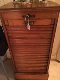 Antique music cabinet (rolls from bottom to top)