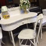 White wicker antique desk and chair from a Greenbriar Lake estate