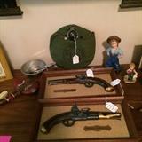 Framed pistol models; canteen