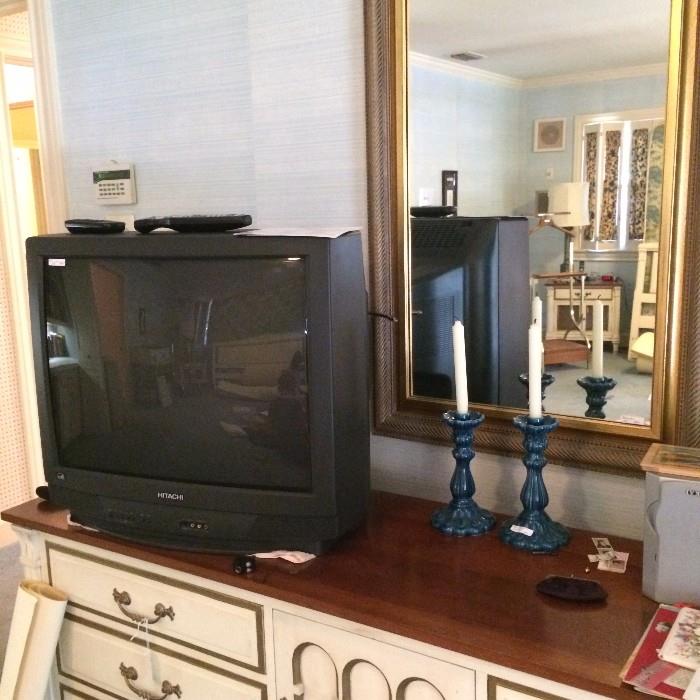 The triple dresser matches the king bed and nightstands.