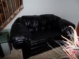 Black leather loveseat w/matching couch