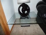 1 of 2 matching stone and glass side tables